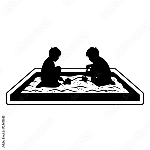 Two children playing in a sandbox