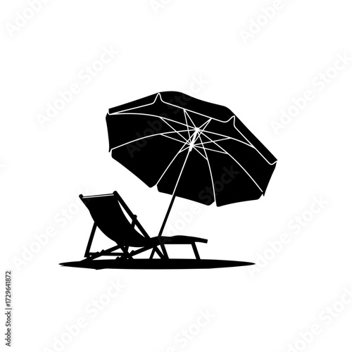 Silhouette of a beach chair and umbrella