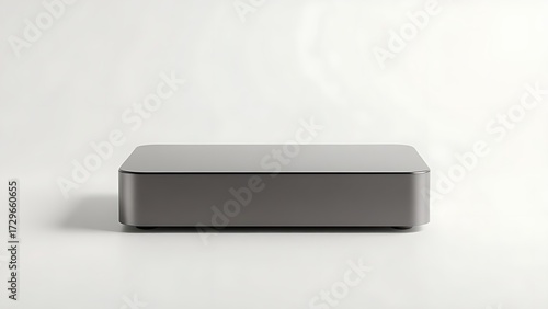 Wallpaper Mural Sleek rectangular device with glossy finish on a gradient backdrop, exemplifying minimalist technological aesthetics. Torontodigital.ca