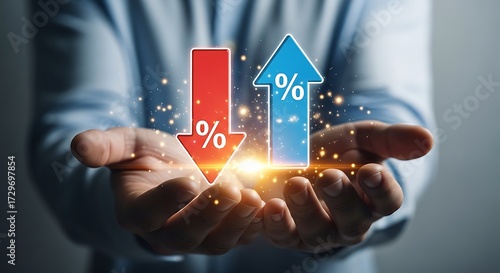 Hands holding up and down arrows with percentage signs symbolizing financial change finance
