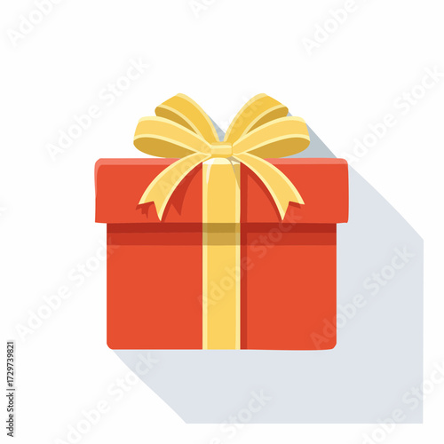 Bright red gift box with golden bow for holiday celebrations