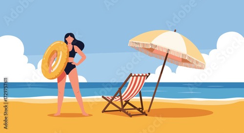 A woman in a swimsuit holding a float on the beach with a chair and umbrella.