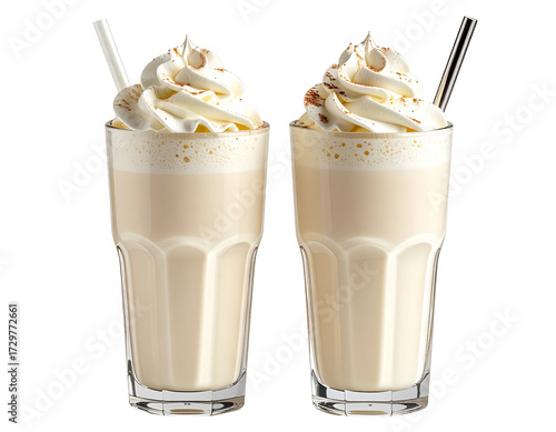 Two glasses of milkshake, topped with whipped cream