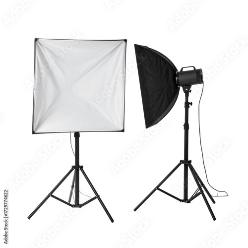 Professional  lighting equipment displayed against a black background showcases a softbox for diffused light and a spotlight with a black reflector, presenting tools used for photography.