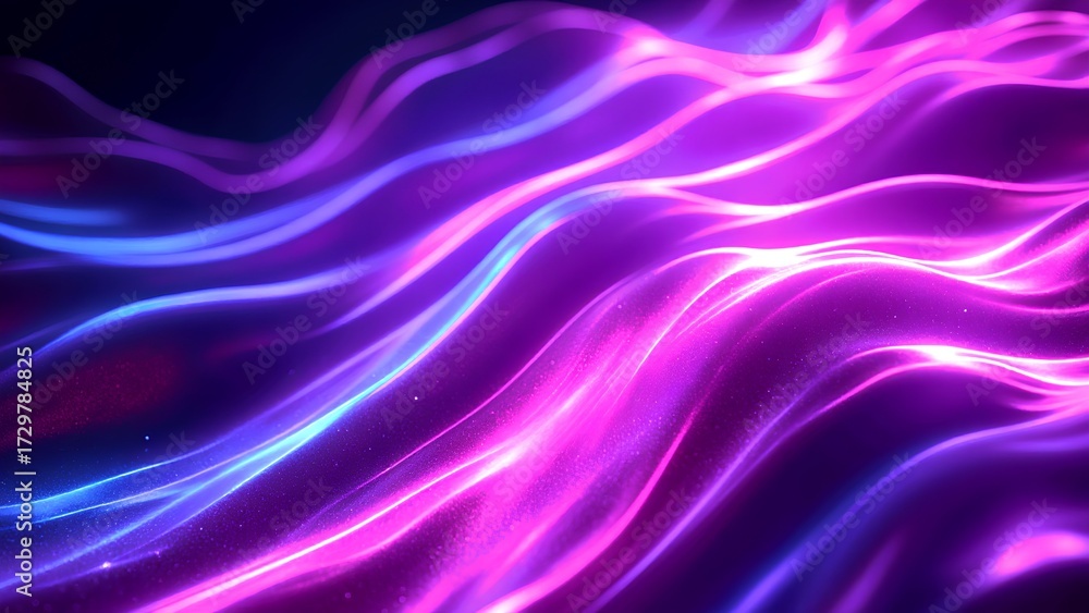 Obraz premium A vibrant abstract image showcasing flowing waves of purple and blue light, creating a dynamic and energetic visual effect.