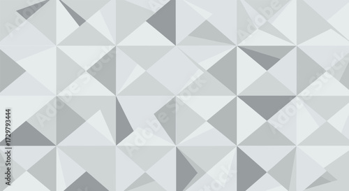 An abstract geometric pattern composed of repeating triangles and quadrilaterals in various shades of gray creating a modern and minimalist design aesthetic.