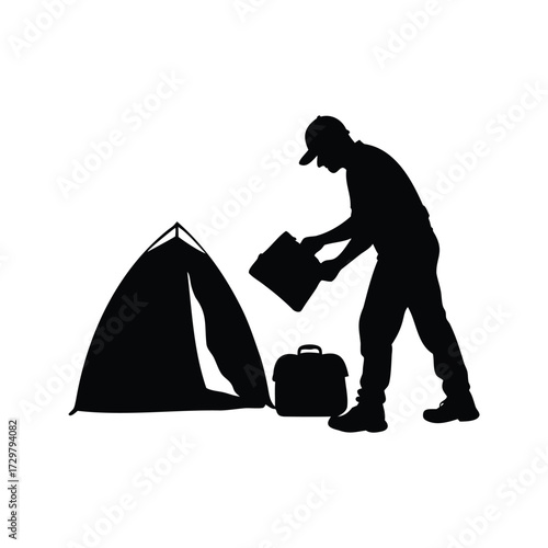 Silhouette of a camper setting up tent with camping equipment outdoors, camper packing gear silhouette vector illustration