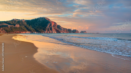 Fototapeta Naklejka Na Ścianę i Meble -  Beach of Cleopatra with sea and rocks of Alanya peninsula - Antalya, Turkey 