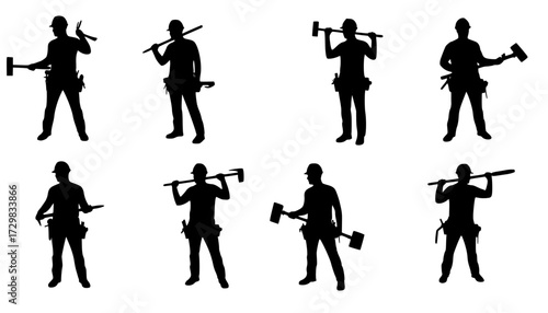 Construction workers silhouette holding tools ready for any project
