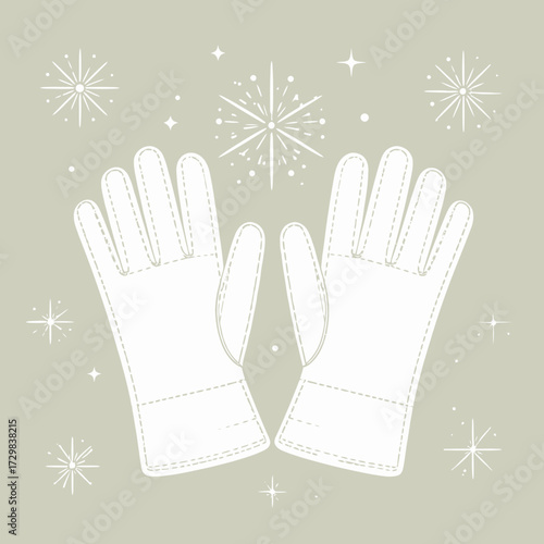 Winter gloves with snowflake accents on a light grey background