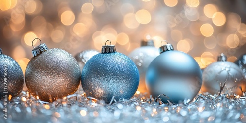 Silver & blue baubles, bokeh lights. Festive decor