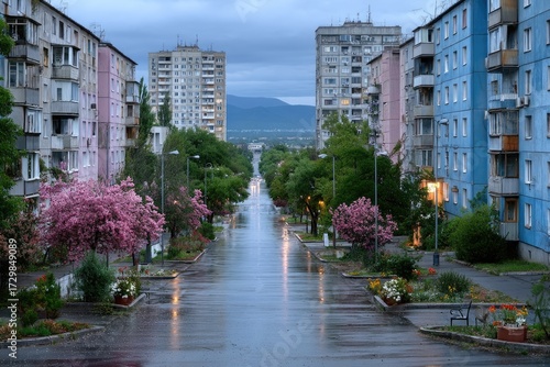 Urban Landscape after Rain with Colorful Apartment Buildings and Flowering Trees