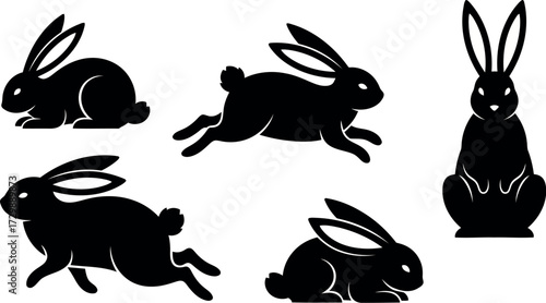 Vector art of set of five black silhouette rabbits in various poses