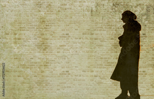 Refugee in Ukraine and Gaza and in the world showed as shadows on a wall with barbed wire
