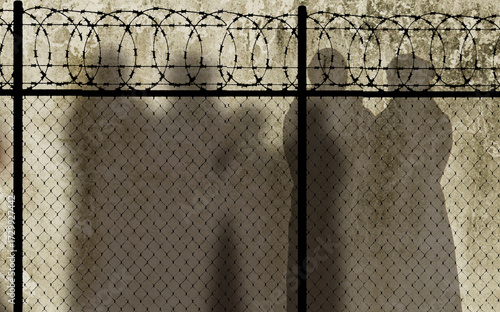Refugee in Ukraine and Gaza and in the world showed as shadows on a wall with barbed wire