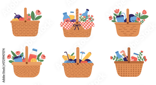 Set of woven picnic baskets filled with fruits drinks and flowers.