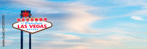 Welcome To Fabulous Las Vegas Sign With Cloudy Blue Sky Background
