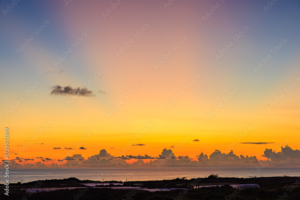 Obraz premium 宮古島 来間島 日没写真 夕焼け 海