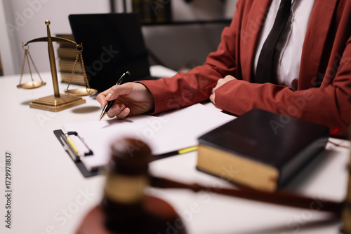 Justice and laws concept. Lawyer businesswoman with law book in a modern office,
