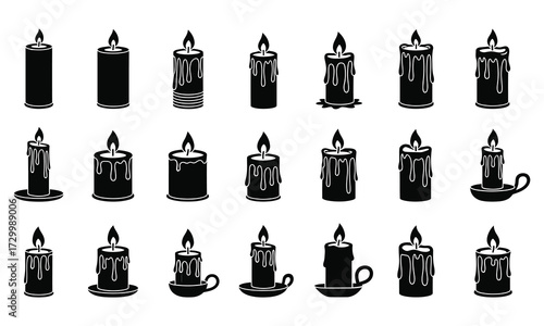 Burning candles dripping wax flame