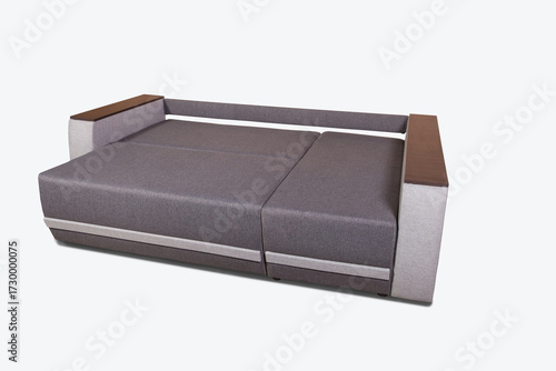 Isolated fold-out sofa with drawer for bedding on white background.