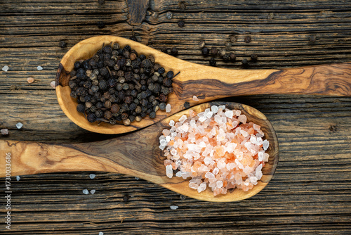 Himalayan salt and pepper on olive wood cooking spoons