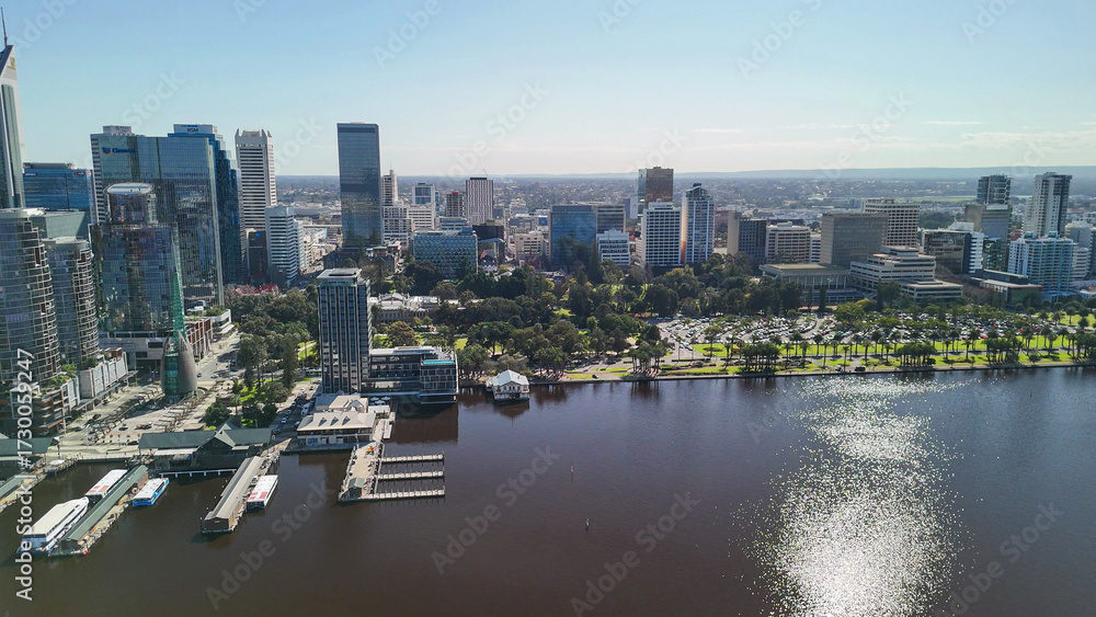 Fototapeta premium Aerial view of Perth skyline from Swan River with clear blue sky and sunny day reflections