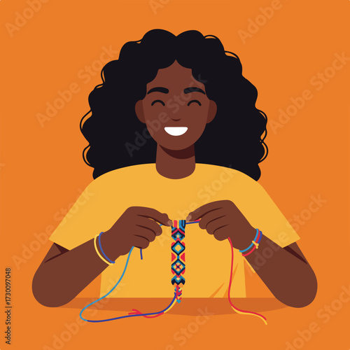 Smiling woman making a colorful friendship bracelet on an orange background