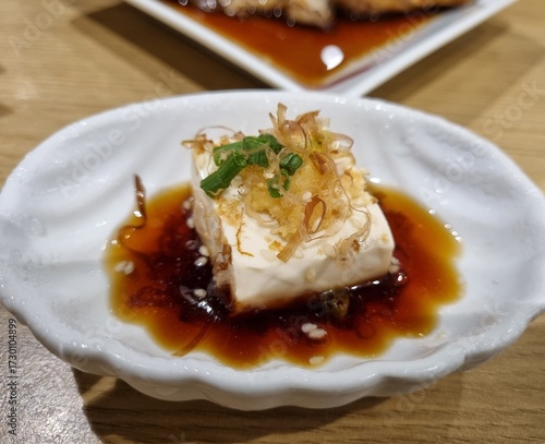 Soft and vegan healthy Japanese food style, Hiyayakko are soft soy and soy been sauce very delicious of the meal. holidays, menu, restaurant, arts, asian food, luxury, style, lifestyle .