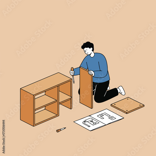 Man assembles wood cabinet with screwdriver following instructions on the floor