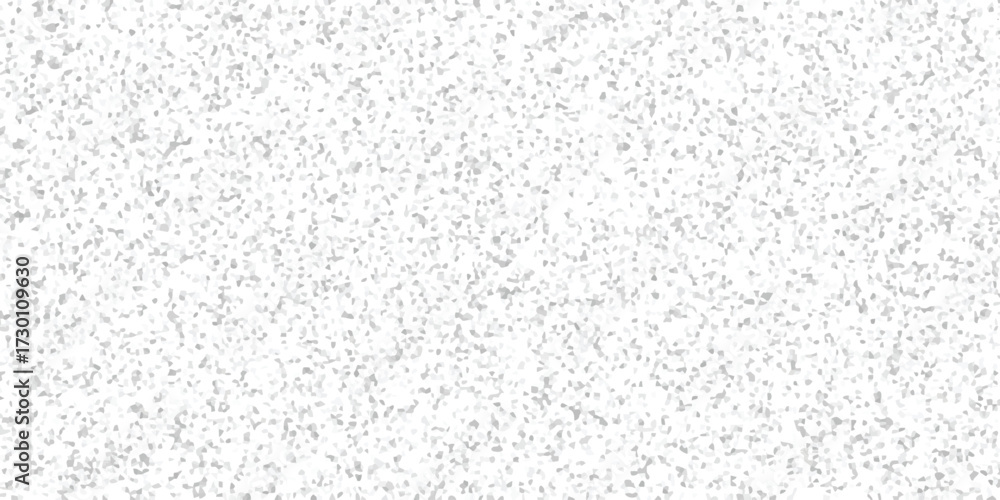 Obraz premium Abstract speckled background with a fine granular texture in shades of grey and white, ideal for subtle design elements and digital backdrops