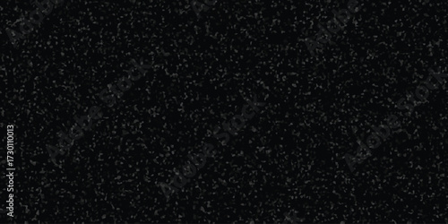 Monochrome speckled texture on a black background, a subtle granular pattern for abstract design and digital art applications