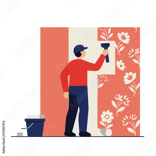 Worker smooths floral wallpaper with tool, bucket, roller by