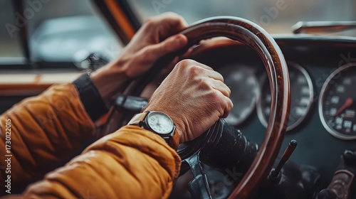 Hands on a Classic Car's Steering Wheel