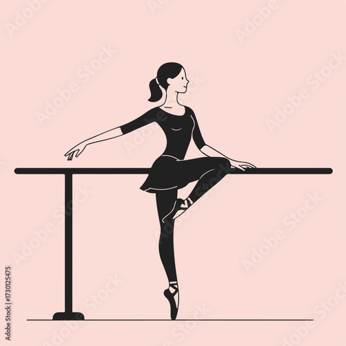 Ballerina poses at barre in black leotard and ballet shoes