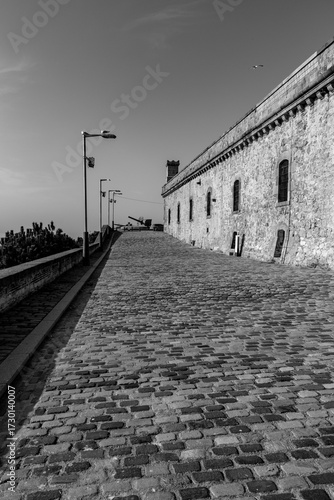 Montjuic Castle is an old military fortress, with roots dating back from 1640, built on top of Montjuic hill in Barcelona, Spain