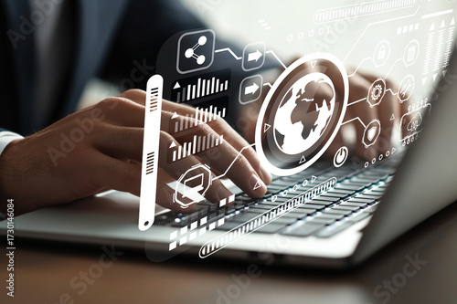 Hands Typing on Laptop with Digital Interface Displaying Global Data and Analytics in Business Environment for Technology and Innovation Themes