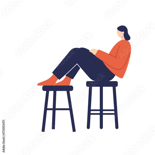 Woman seated cross-legged atop two stools, wearing orange top and dark pants
