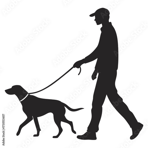 Silhouette of a man walking a dog