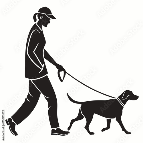 Silhouette of a woman walking a dog on a leash