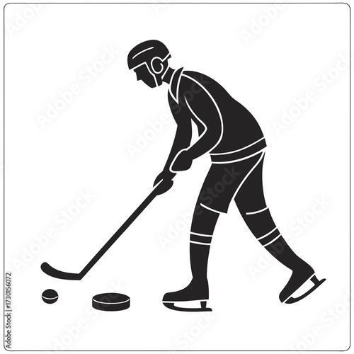 Silhouette of a hockey player in full gear skating on ice and holding a stick ready to hit the puck and ball