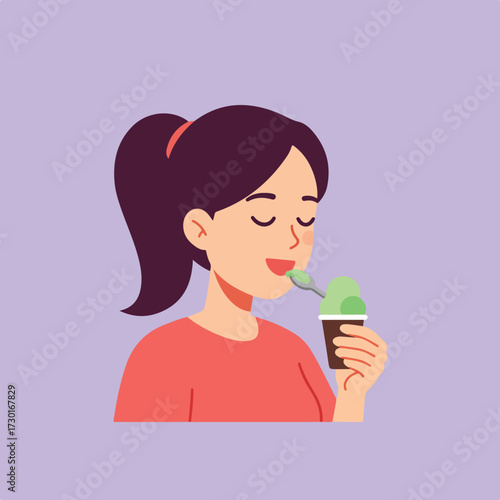 Girl eats green ice cream with spoon; light purple backdrop