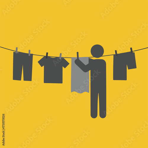 Silhouette putting laundry on line, pegs, pants, shirt, towel on gold