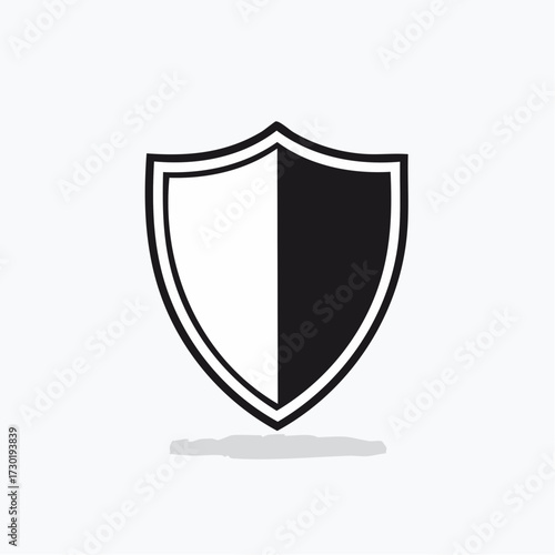 Abstract shield design featuring a black and white color scheme with a shadow effect, suitable for security or protection concepts