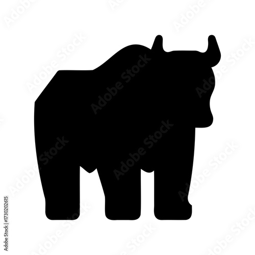 Silhouette of a robust and powerful yak or bison standing tall