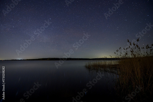 Obraz na plátně Night sky reflected in Dnieper River waters