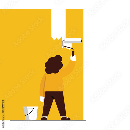 Person painting a yellow wall white with a roller, bucket nearby