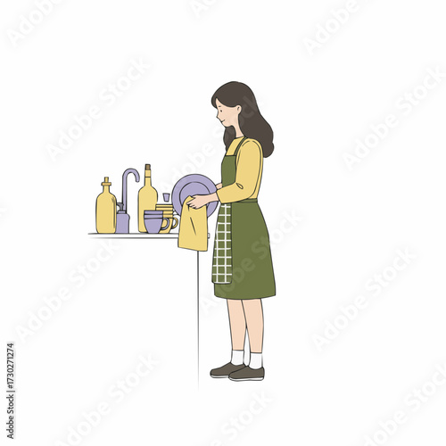 Young woman washing dishes and drying them with a towel in kitchen  