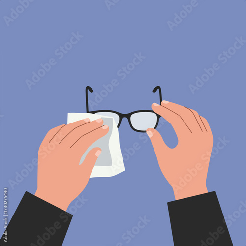 Glasses being cleaned by hands and a cloth on a blue background