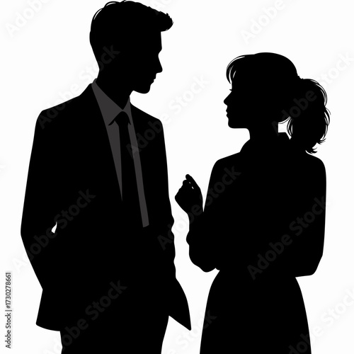 Colleagues animatedly discussing work situation in silhouette against plain background